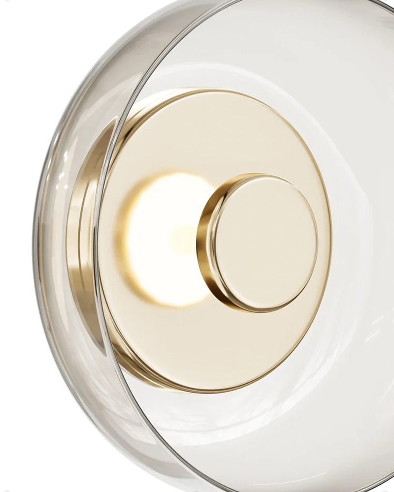 Wandlampe aus Gold und Glas