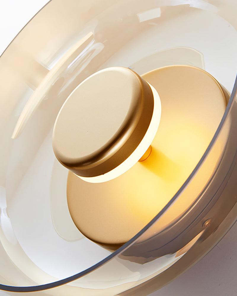 Wandlampe aus Gold und Glas
